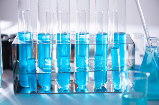 Blue liquid in 4 test tubes