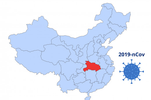 Blue map of China with highlighted red Wuhan