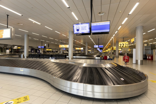 Amsterdam, Netherlands - Jul 22, 2020: Schiphol Airport Conveyor Belt Hallway Empty During Covid-19 Outbreak