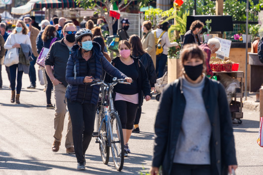 People on street wearing masks